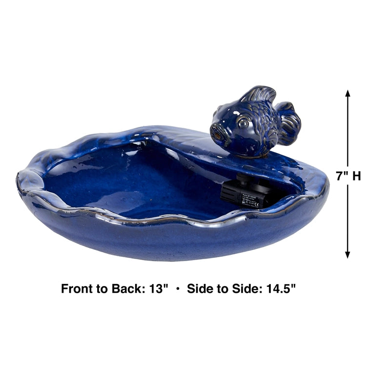 Ceramic Koi Solar Fountain features a blue basin with a koi fish spout, powered by solar energy for continuous water flow, perfect for outdoor relaxation.