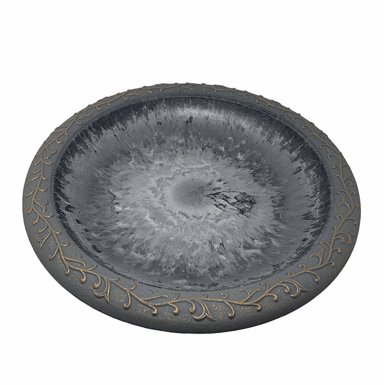 Dove gray fiber clay birdbath bowl with embossed vine border, angled view
