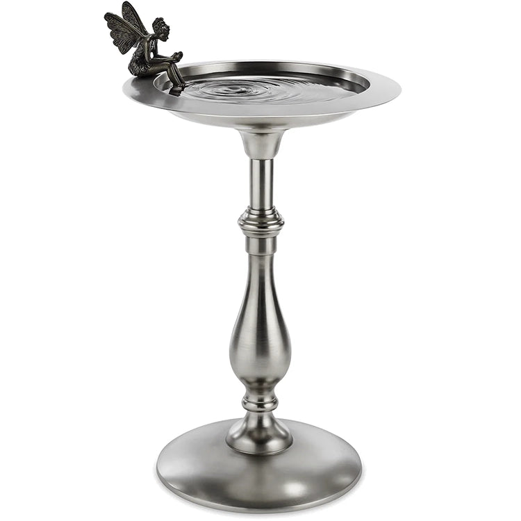 Silver bird bath with a fairy figurine on a white background