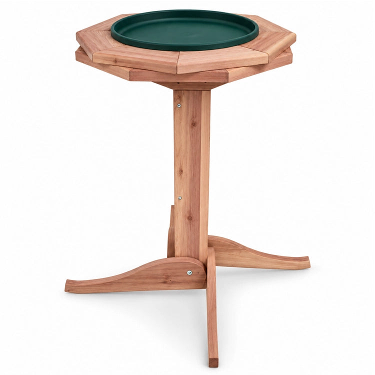 Western Red Cedar Heated Bird Bath with a wooden pedestal, black plastic tray, and thermostatically controlled heater, ideal for providing birds with water in cold weather.