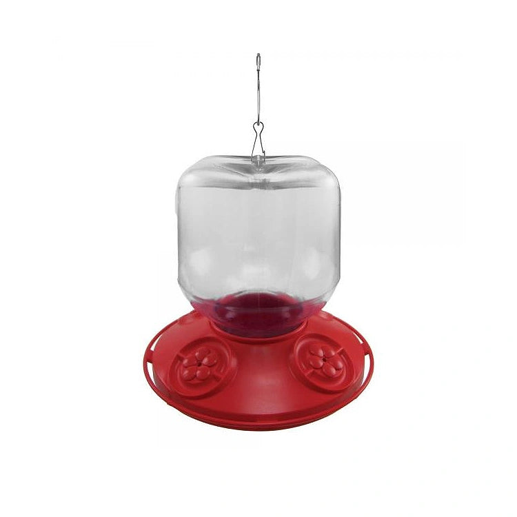 Dr. JB's Hummingbird Feeder 32 oz., close-up view showing the clear plastic bottle with a wide mouth, red base, and silver S-hook for hanging.