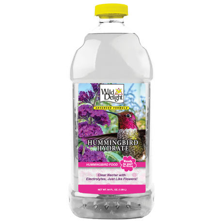 Wild Delight Hummingbird Hydrate RTU, 64 oz. bottle with yellow cap, featuring a hummingbird and pink flower design, offers nutrient-rich, ready-to-use nectar for hummingbirds.