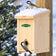 Duncraft wooden winter roosting house mounted on a post with a snow-covered roof, two black-capped chickadees, and a green Duncraft logo against a snowy evergreen background.