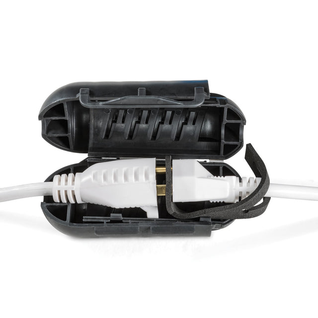 ClickShield™ Cord Lock showcases two connected power-cord ends encased in a black, gasket-sealed housing, ensuring waterproof protection for heated birdbath connections.