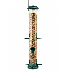 Green tube bird feeder filled with mixed seed, featuring multiple feeding ports and perches.