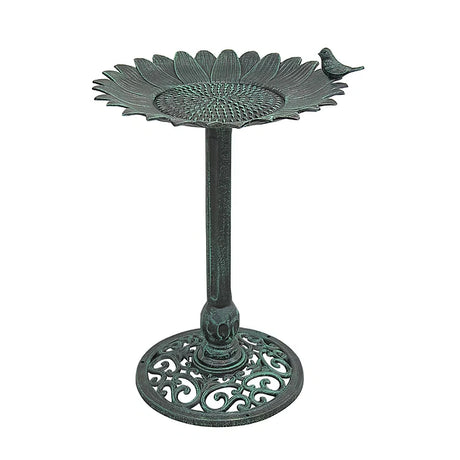 Decorative bird bath with sunflower design on a white background
