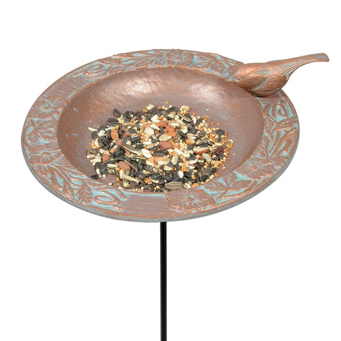 Chickadee Garden Bird Feeder featuring a charming chickadee, filled with seeds, and embossed leaf border for perching. Hand-cast metal with a rust-proof finish.