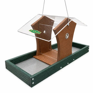 Hopper bird feeder with green platform base on a white background