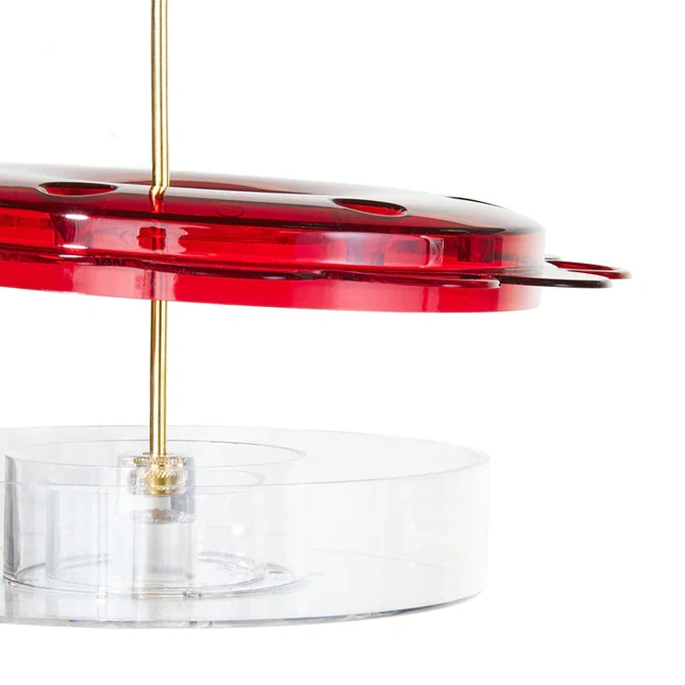 12 oz. Hummerfest Hummingbird Feeder featuring a two-tiered design with a red top plate, brass post, and clear tray, ideal for viewing nectar levels.