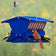 Electric Blue Absolute II bird feeder with seed, visited by a cardinal, goldfinches, and a chickadee. Steel construction with weight-activated perches.
