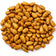 Pile of spicy hot whole sunflower hearts bird seed on a white background