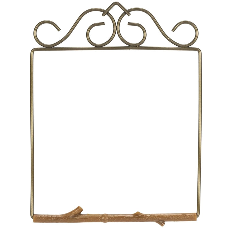 Decorative metal frame with intricate designs on a white background