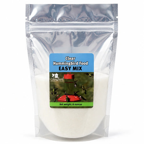 Clear Hummingbird Food Easy Mix in resealable pouch packaging with hummingbird feeder label and white nectar mix inside.