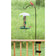 Vertical Mount Baluster Hanger with a bird feeder attached, showcasing birds perched on it, designed for porch use with adjustable clamp for square balusters.