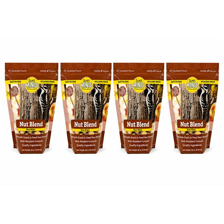 Four packages of Suet Minis Nut Blend for birds on a white background