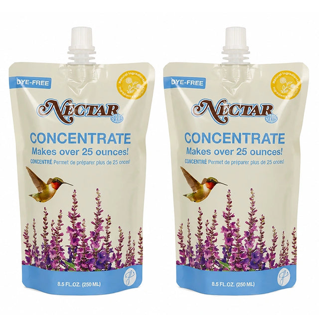 Two bottles of clear hummingbird nectar concentrate, 8.5 ounces each, formulated for mixing fresh nectar for hummingbird feeders.