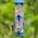 Wild Wings Fantasy Floral Easy Clean Plastic Bird Feeder with six feeding ports, showing birds feeding from it in a garden setting.